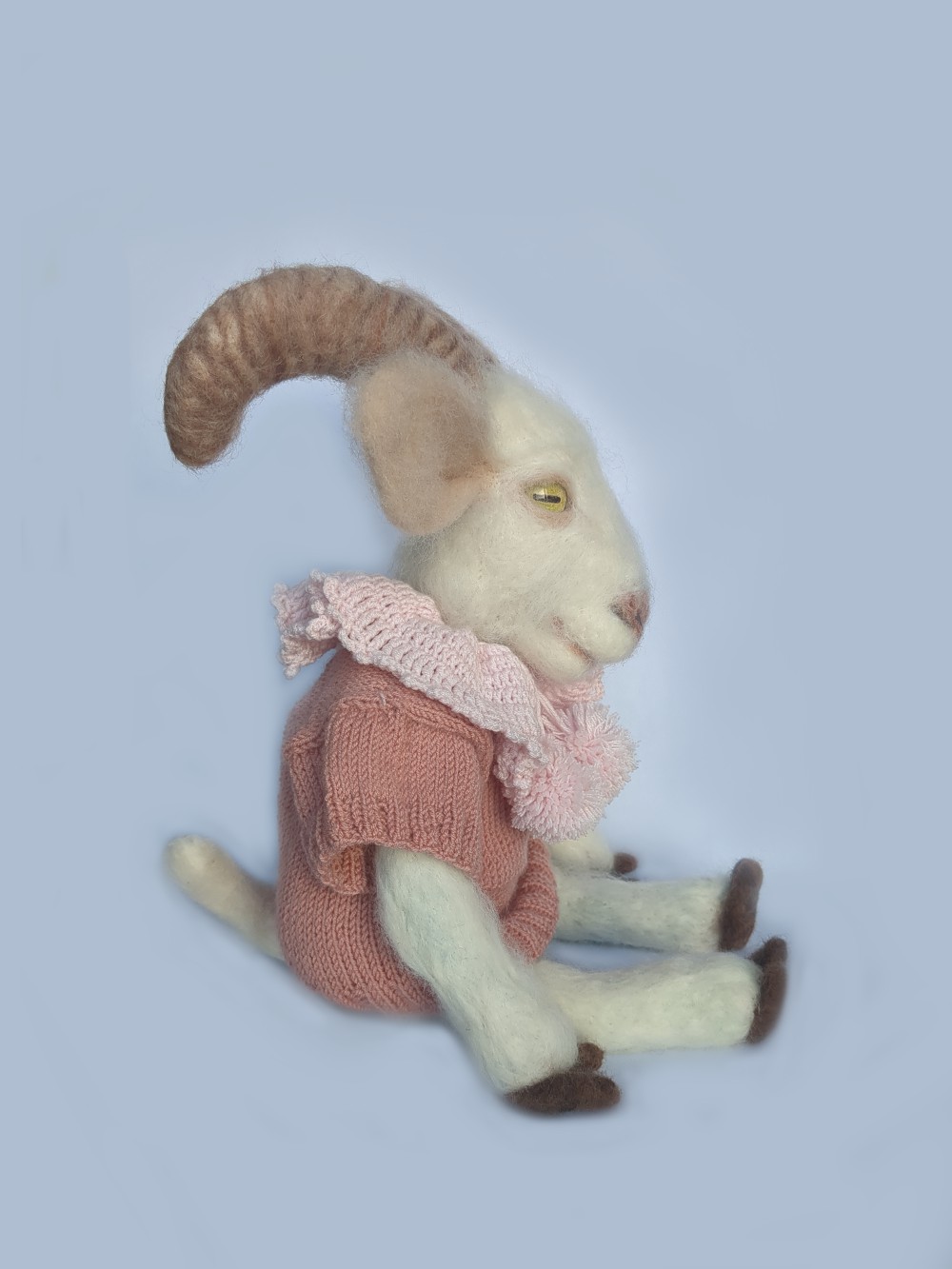 A handcrafted doll of Peace the Saanen Goat