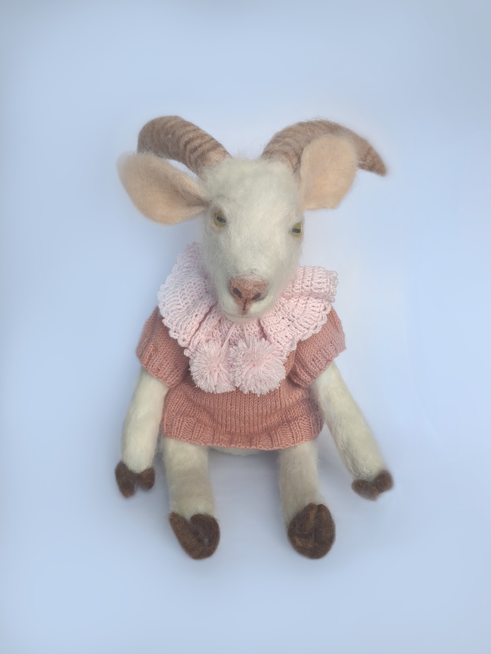 A handcrafted doll of Peace the Saanen Goat